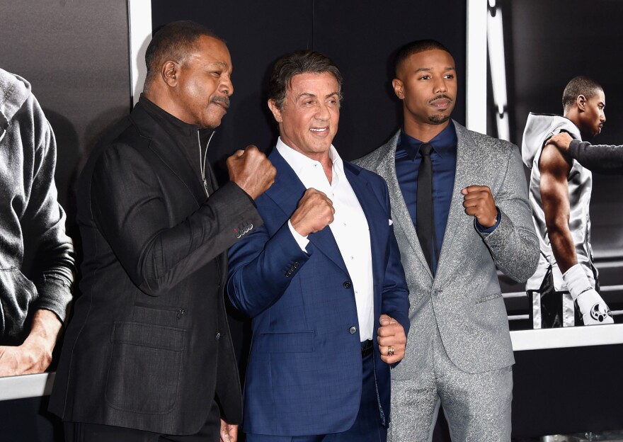 (L-R) Director Ryan Coogler, actor/producer Sylvester Stallone and actor Michael B. Jordan attend Warner Bros. Pictures' "Creed" Premiere at Regency Village Theatre.