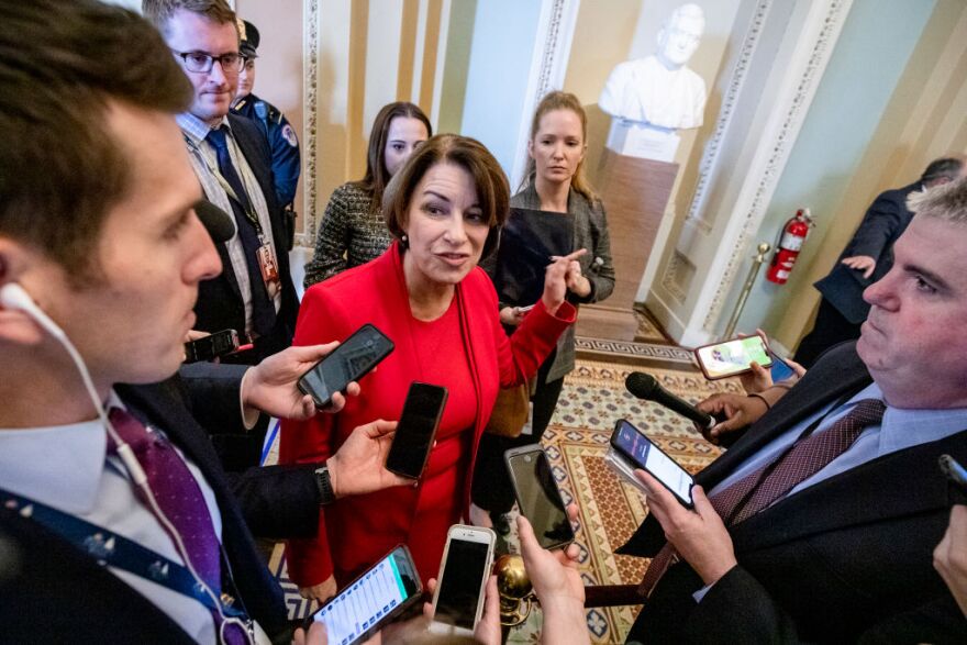 WASHINGTON, DC - FEBRUARY 3: Senator Amy Klobuchar (D-MN) talks to reporters just off the Senate floor during a recess in the Senate impeachment trial of President Donald Trump on February 3, 2020 in Washington, DC. Closing arguments begin Monday after the Senate voted to block witnesses from appearing in the impeachment trial. The final vote is expected on Wednesday. (Photo by Samuel Corum/Getty Images)