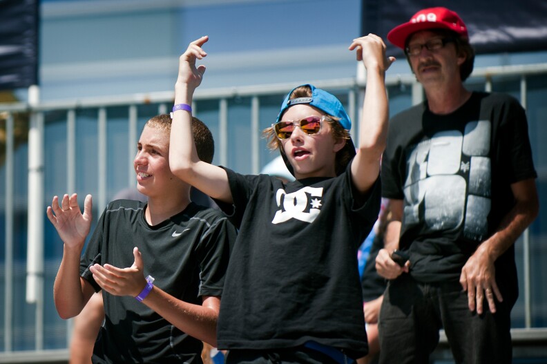 Fans cheer on skaters at the event deck at L.A. Live on Thursday during the Women's Street competition.