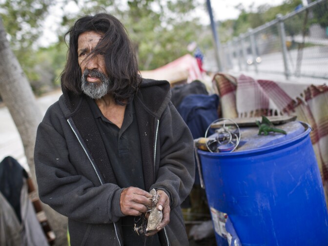 Jesus Torres has lived in the Arroyo Seco riverbed for almost three years. Torres was born in the city of LA during the time of the Watts Riots in 1965. Dozens of encampments have taken root in and around the Arroyo Seco riverbed in the past several years and are now visible along the 110 Freeway.