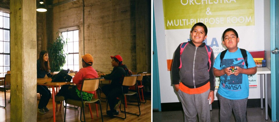 Noemí's sons sit at a table at CoachArt.