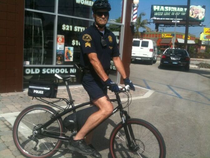 LAPD Sargent Matthew Bygum on the department's new electric hybrid bicycle.