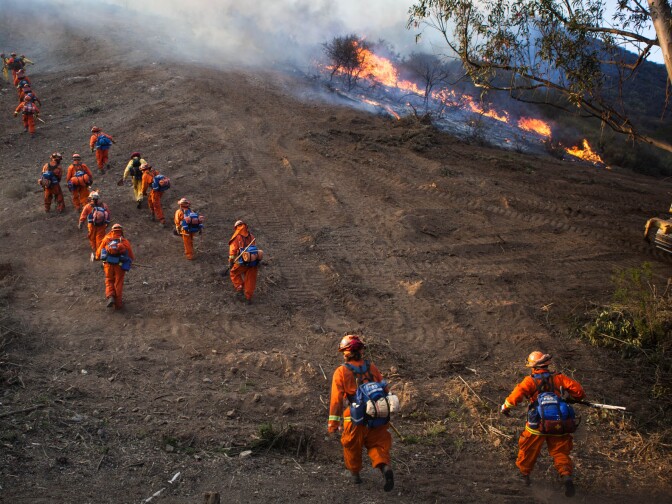 Smokejumpers make their way toward a fire west of Thousand Oaks on May 2, 2013.