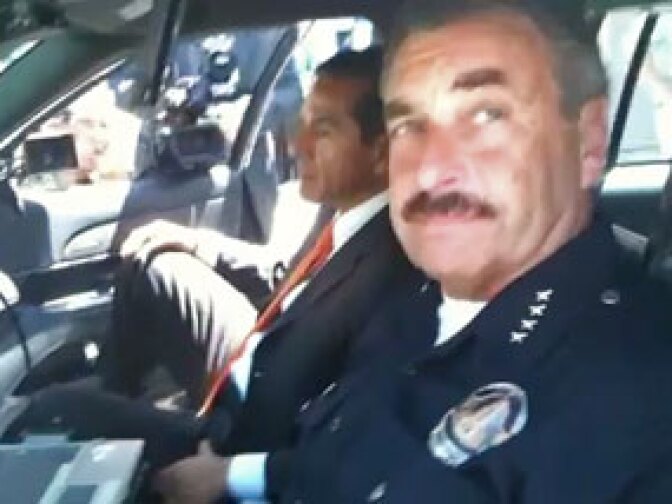 Chief Charlie Beck shows off patrol car camera system