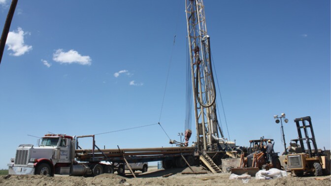 Drillers are bringing in large rigs like this one from all over the west, to drill deeper wells in the quest for water. 