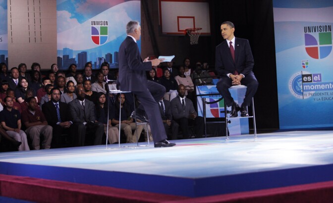MARCH 2011: U.S. President Barack Obama (R) and moderator Jorge Ramos participate in an education town hall hosted by Univision at Bell Multicultural High School, Washington, DC. Fusion, Univision's new English language channel will launch tonight with another Ramos interview with President Obama. 