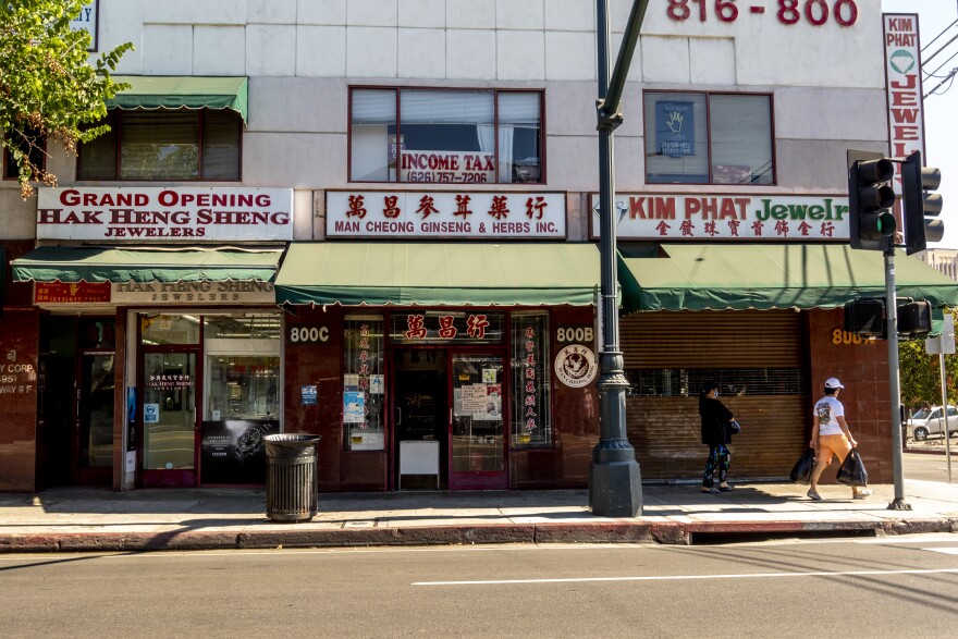 A corner in LA Chinatown, with store signs in both English and Chinese