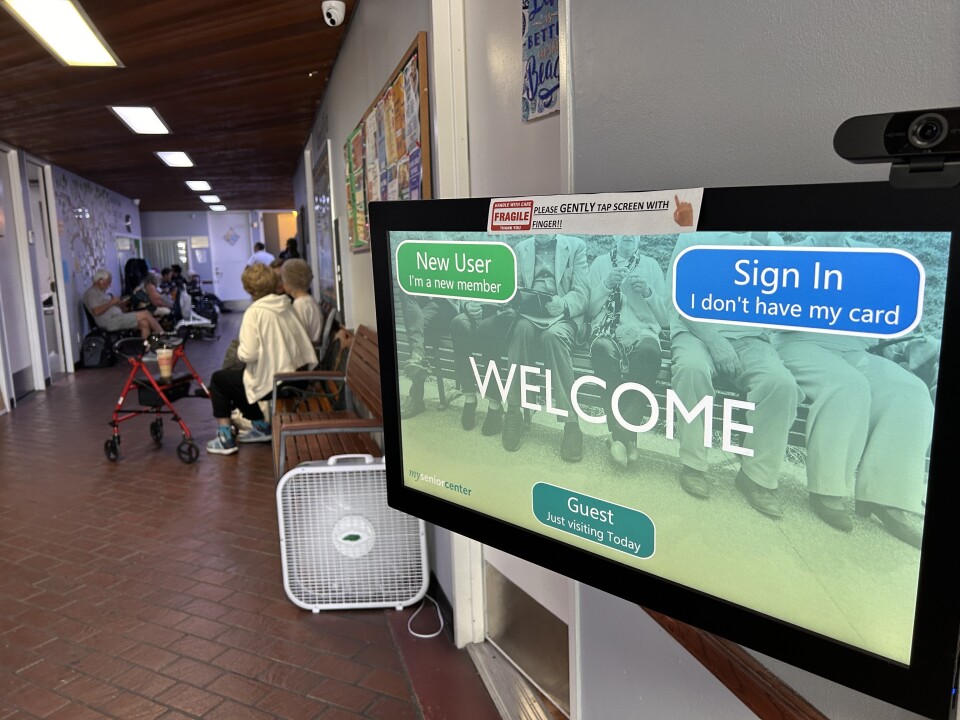 A computer display screen with the word "welcome" in the center, "new user" on the top left and "sign in, I don't have my card" on the top right.