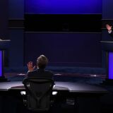 CLEVELAND, OHIO - SEPTEMBER 29:  U.S. President Donald Trump and Democratic presidential nominee Joe Biden participate in the first presidential debate moderated by Fox News anchor Chris Wallace (C) at the Health Education Campus of Case Western Reserve University on September 29, 2020 in Cleveland, Ohio. This is the first of three planned debates between the two candidates in the lead up to the election on November 3.  (Photo by Scott Olson/Getty Images)