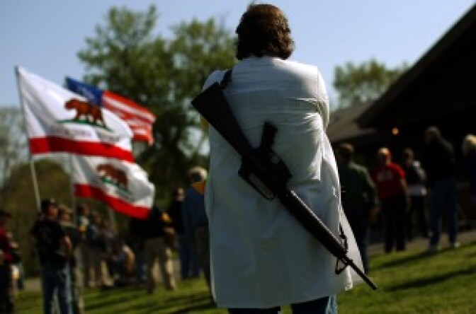 Gun rights groups gather at Fort Hunt Park for an 'Open Carry Rally' on April 19, 2010 in Alexandria, Va. The groups gathered in a National Park area to publicly carry weapons as a demonstration of their constitutional rights to bear arms.