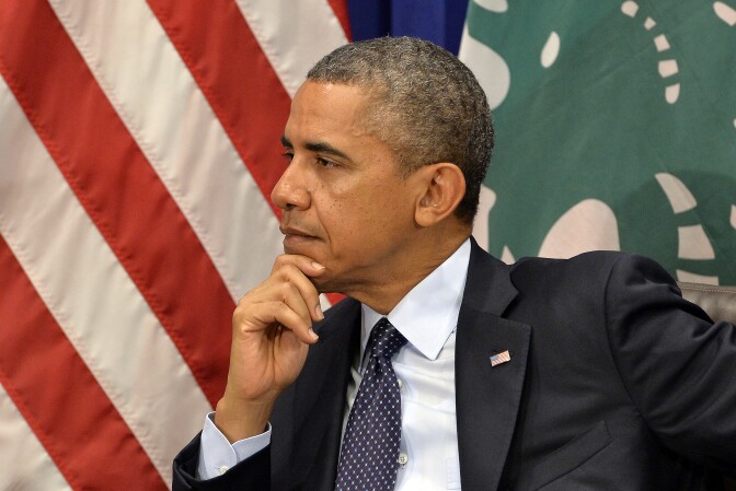 President Barack Obama listens to President Michel Sleiman of Lebanon speaking to the media before a bilateral meeting on the sideline of the 68th United Nations General Assembly at the UN in New York on September 24, 2013. At the assembly, Obama talked about the importance of engaging diplomatically with Iran.