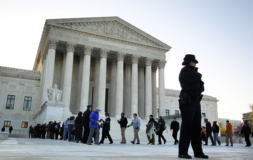General public with tickets to listen to a hearing on the Obamacare line up for entering the U.S. Supreme Court March 27, 2012 in Washington, DC. The Supreme Court continues to hear oral arguments on the Patient Protection and Affordable Care Act.