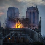 PARIS, FRANCE - APRIL 15: Smoke and flames rise from Notre-Dame Cathedral on April 15, 2019 in Paris, France. A fire broke out on Monday afternoon and quickly spread across the building, collapsing the spire. The cause is yet unknown but officials said it was possibly linked to ongoing renovation work. (Photo by Veronique de Viguerie/Getty Images)