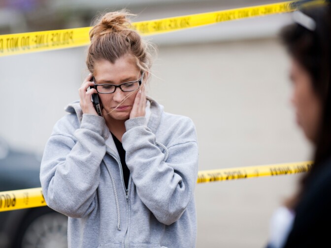 Santa Monica College student Audra Bell was in the library when the shooter entered and opened fire. "[Police] had us crawl on the ground," she said. "There was a body on my right hand side, and the glass of the library doors was all broken and it looked like it had been shot, and then there was blood everywhere."