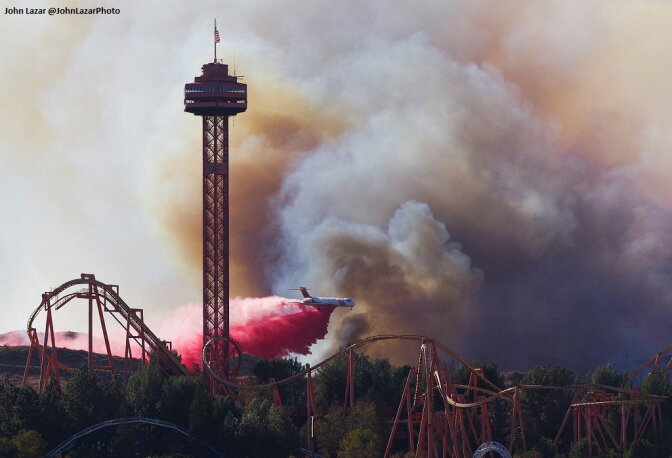 Firefighters drop fire retardant on the Rye Fire in Santa Clarita.
