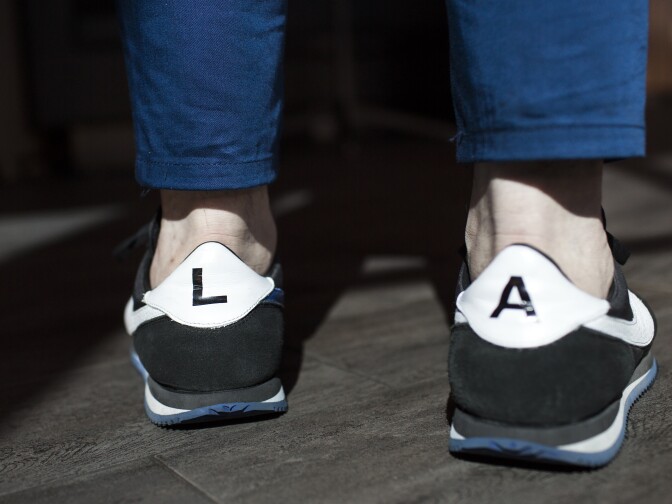 Executive Chef Vartan Abgaryan wears shoes representing Los Angeles at 71 Above, the new restaurant on the 71st floor of the U.S. Bank Tower in downtown Los Angeles, on Thursday afternoon, Sept. 22, 2016.