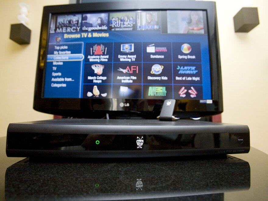 TiVo is trying to re-establish its place in the digital recording world with a new box, called TiVo Premiere, that draws video from a variety of sources, including cable, satellite and the Internet.