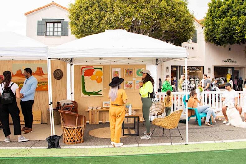 People broswing the art space