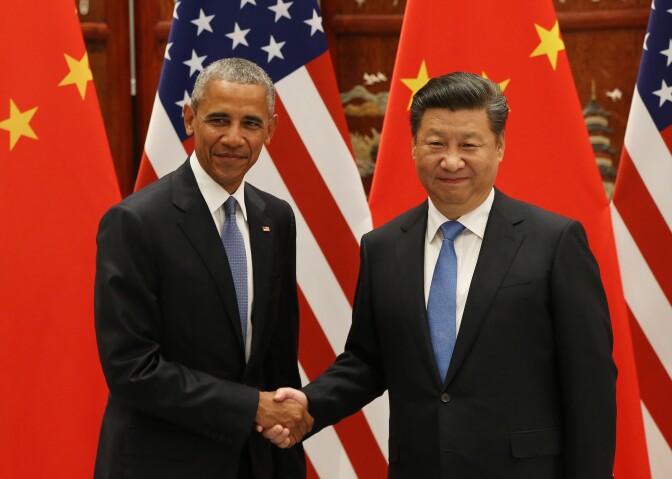 US President Barack Obama (L) and Chinese President Xi Jinping shake hands during their meeting at the West Lake State Guest House in Hangzhou on September 3, 2016.
The United States and China on September 3 formally joined the Paris climate deal, with US President Barack Obama hailing the accord as the "moment we finally decided to save our planet". World leaders are gathering in Hangzhou for the 11th G20 Leaders Summit from September 4 to 5. / AFP / POOL / HOW HWEE YOUNG        (Photo credit should read HOW HWEE YOUNG/AFP/Getty Images)