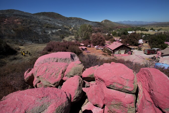 San Bernardino National Forest crews work on the Pilot Fire behind Ryan Nuckols’ home in Hesperia, California on August 9th, 2016. 