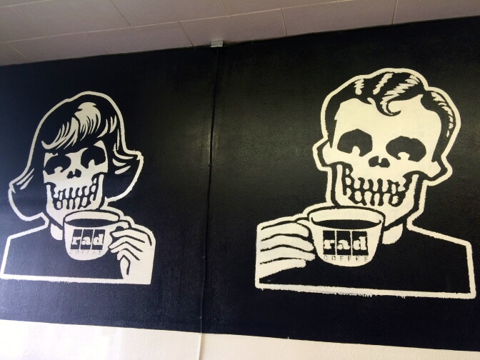 The official logo of Rad Coffee adorns the shop walls.