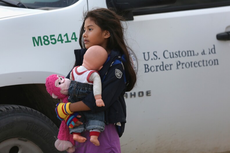 MISSION, TX - JULY 24:  Salvadorian immigrant Stefany Marjorie, 8, holds her doll Rodrigo while going home on July 24, 2014 in Mission, Texas. Tens of thousands of immigrant families and unaccompanied minors from Central America have crossed illegally into the United States this year and presented themselves, with documents showing their nationalities, to federal agents, causing a humanitarian crisis on the U.S.-Mexico border. Texas' Rio Grande Valley has become the epicenter of the latest immigrant crisis, as more of them enter from Mexico into that sector than any other stretch of the America's 1,933 mile border with Mexico.  (Photo by John Moore/Getty Images)