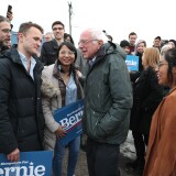 MANCHESTER, NEW HAMPSHIRE - FEBRUARY 04: Democratic presidential candidate Sen. Bernie Sanders (I-VT) greets a group of supporters after arriving in New Hampshire on February 04, 2020 in Manchester, New Hampshire. Mr. Sanders arrived in New Hampshire to campaign leading up to the primary on February 11 as he awaits the release of the results from the Iowa caucus. (Photo by Joe Raedle/Getty Images)