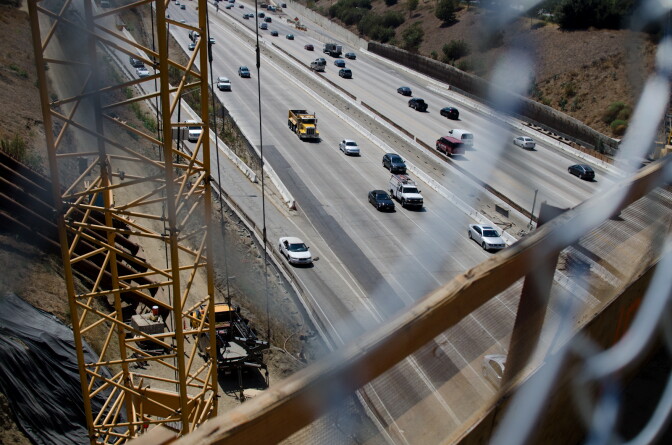 Motorists drive down the 405 Freeway where closures will occur from Interstate 10 to the 101 Freeway, northbound, and from the 101 Freeway to Getty Center Drive, southbound, during the demolition of the north side of the Mulholland Drive bridge Saturday to Sunday in Los Angeles, Calif., Tuesday, September 25, 2012. The demolition of the south side of the 608-foot bridge also caused freeway closures in July.