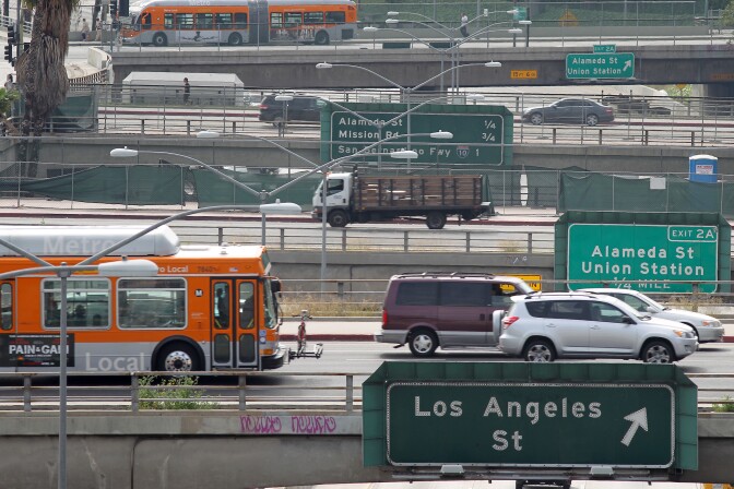 LOS ANGELES, CA - APRIL 25:  Surface street traffic corsses above the US 101 freeway on April 25, 2013 in Los Angeles, California. The nation's second largest city, Los Angeles, has again been ranked the worst in the nation for ozone pollution and fourth for particulates by the American Lung Association in it's annual air quality report card. Ozone is a component of smog that forms when sunlight reacts with hydrocarbon and nitrous oxide emissions. Particulates pollution includes substances like dust and soot.   (Photo by David McNew/Getty Images)