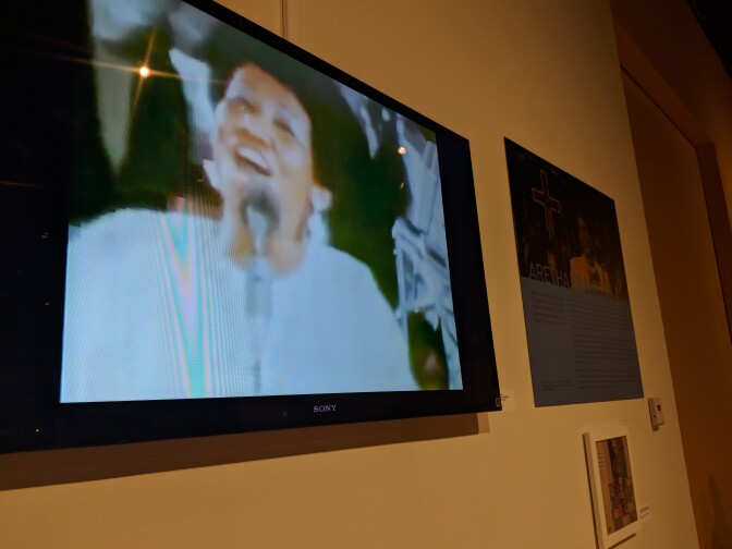 A loop of Aretha Franklin singing "Amazing Grace" plays at the exhibit "How Sweet the Sound," on display at the California African American Museum.