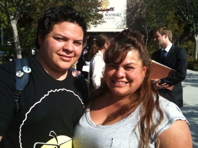 Mathew Hernandez, 16, with his mother Melisa Lopez outside Roosevelt High School in Boyle Heights.
He said Los Angeles police ticketed him for being off campus during school hours.