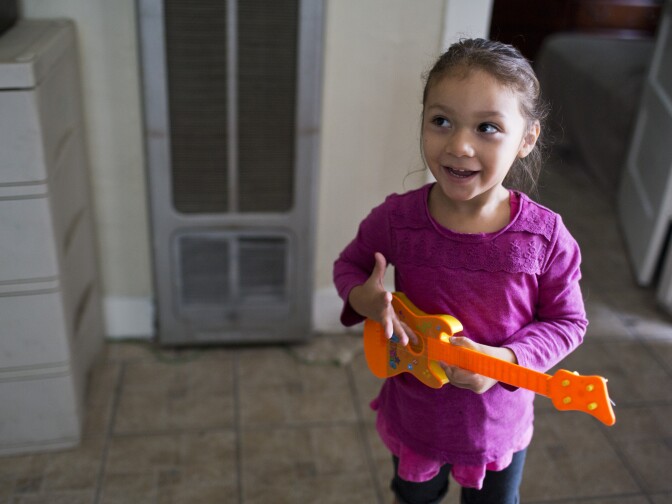 Madeline Cornejo, 3, plays inside her South Los Angeles home before going to her grandmother's house on Friday, August 21, 2015. Mother Sara Cornejo was shocked when her daughter, Madeline, was diagnosed with lead poisoning last year. There was lead paint found in Madeline's bedroom.