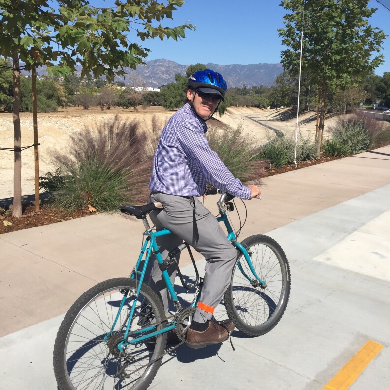 South Pasadena City Councilman Michael Cacciotti takes a minute to admire the view along his city's new Arroyo Seco bike trail, which opened October 20. He says it's the first time in 65 years that people have been able to enjoy this particular view of the entire western San Gabriel Valley, looking north toward Pasadena.