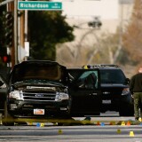FBI agents and local law enforcement examine the crime scene where suspects of the Inland Regional Center were killed on December 3, 2015 in San Bernardino, California. Police continue to investigate a mass shooting at the Inland Regional Center in San Bernardino that left at least 14 people dead and another 17 injured. 