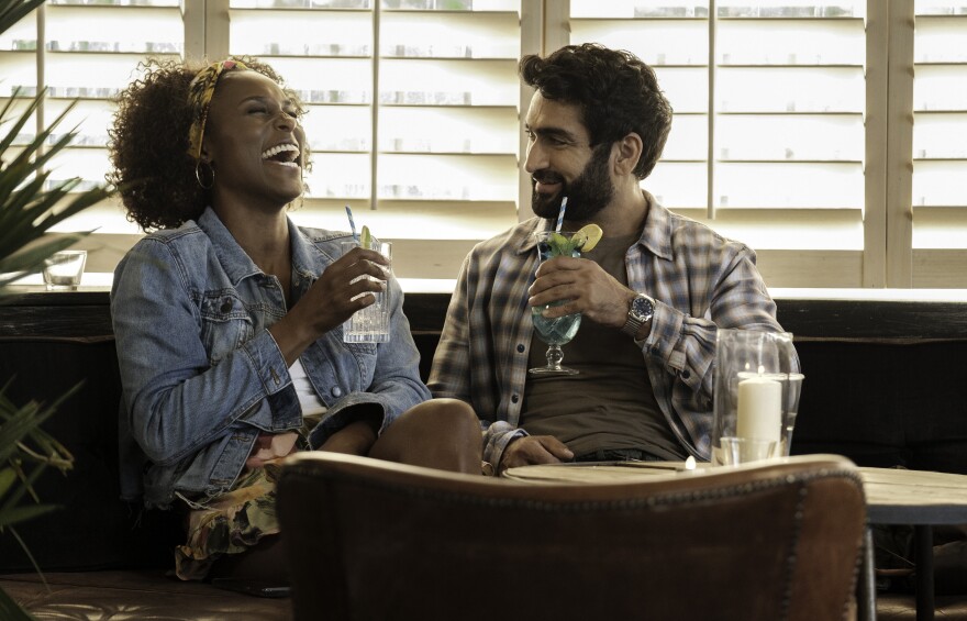Issa Rae as Leilani, Kumail Nanjiana as Jibran of "The Lovebirds" from NETFLIX.