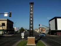 A sign is seen in a deserted section of downtown Stockton, Calif. On Monday, the state's 13th-largest city begins federal court proceedings that could end with it becoming the most populous in the nation to successfully enter Chapter 9 bankruptcy, a move opposed by those who lent the money to keep it flush. (Photo by Justin Sullivan/Getty Images)