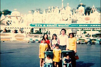 From the L.A. Public Library: "Hom family members stand together outside of Disneyland's well-known Fantasyland boat attraction, It's a Small World. October, 1973. Disney is making big changes to the exhibit.