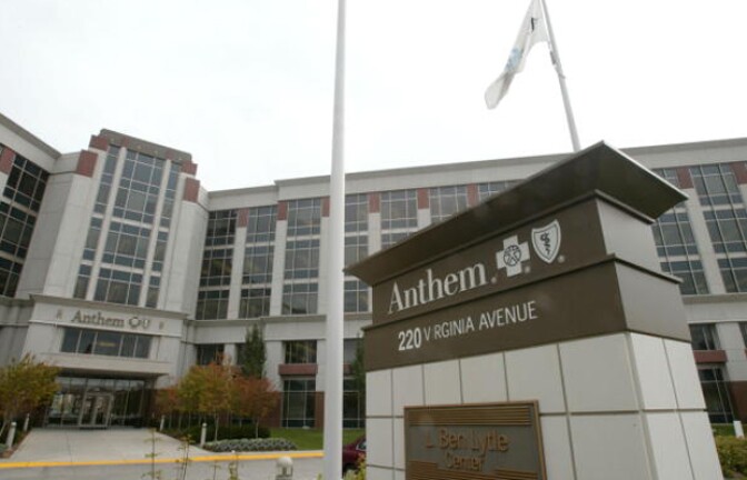 File: The headquarters of Blue Cross Blue Shield health insurer Anthem Inc. is seen October 27, 2003, in Indianapolis, Indiana. Beginning in October, the health insurer won't be covering proton beam treatment for early-stage prostate cancer.