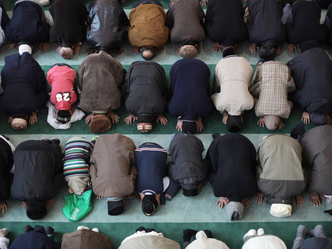 LONDON, ENGLAND - FEBRUARY 18:  Muslim men pray at Baitul Futuh Mosque in Morden on February 18, 2011 in London, England. Around five thousand Muslim men and women converged at the mosque today, which is Western Europe's largest, to Unite against Extremism and pay vigil following a series of sectarian attacks on Ahmadi Muslims in Indonesia.  (Photo by Dan Kitwood/Getty Images)