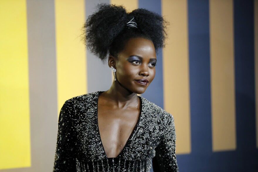 Kenyan-Mexican actress Lupita Nyong'o poses on arrival for the European Premiere of 'Black Panther' in central London on February 8, 2018. / AFP PHOTO / Tolga AKMEN        (Photo credit should read TOLGA AKMEN/AFP/Getty Images)