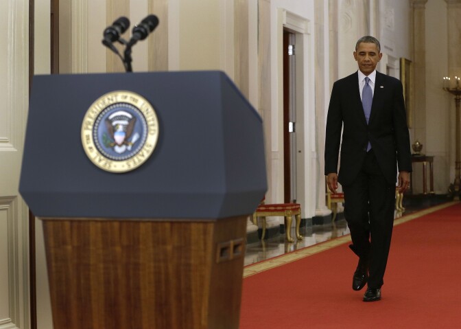 President Obama walks to the podium before addressing the nation in a live televised speech from the East Room of the White House on September 10, 2013 in Washington, DC. President Obama blended the threat of military action with the hope of a diplomatic solution as he works to strip Syria of its chemical weapons. 