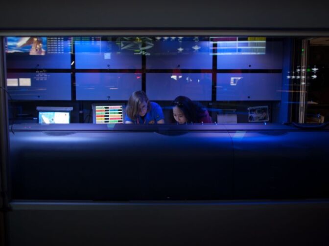 Engineers monitor screens in the Space Flight Operations Facility at the Jet Propulsion Laboratory in Pasdena.