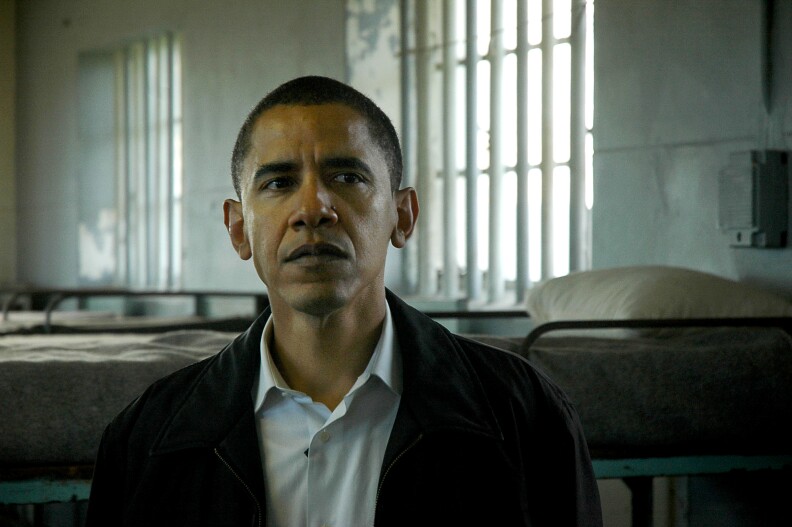 Barak Obama, US senator for Illinois, stands 20 August 2006, on Robben Island, about six kilometres from the city, in Table Bay. Obama was visiting the island prison museum, where Nelson Mandela was imprisoned for about 18 years, as part of a larger visit to the country. 