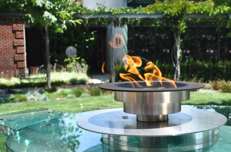 The Olympic Flame burns outside the LA84 Foundation Sports library. The flame is a symbol of peace between the people of the world. 