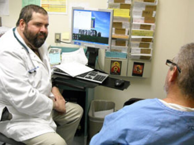 Doctors at California Medical Facility (CMF) in Vacaville, Calif., see inmates in a modern medical clinic.