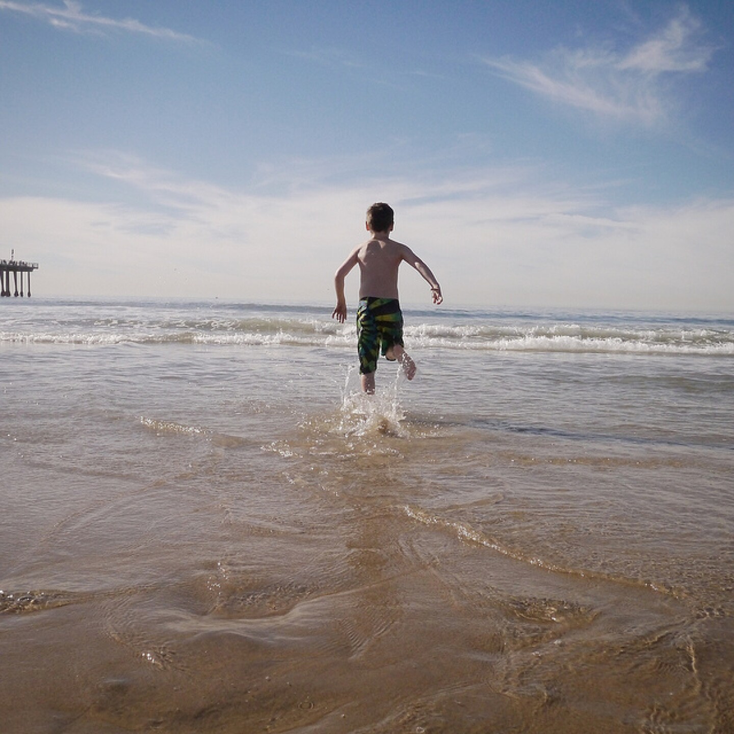 kid frolics in december surf.jpg
