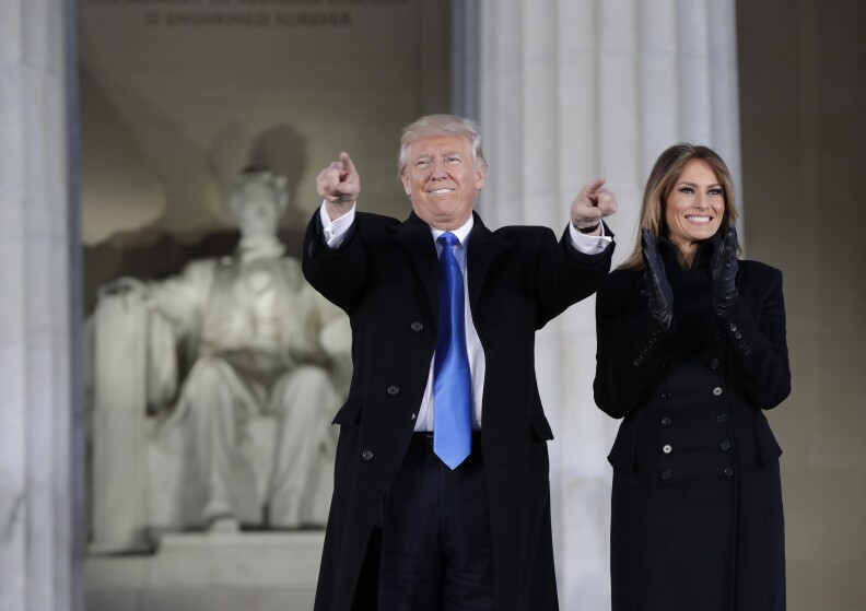 President-elect Donald Trump and his wife Melania Trump arrive at a pre-Inaugural "Make America Great Again! Welcome Celebration" at the Lincoln Memorial in Washington, Thursday, Jan. 19, 2017. (AP Photo/Evan Vucci)