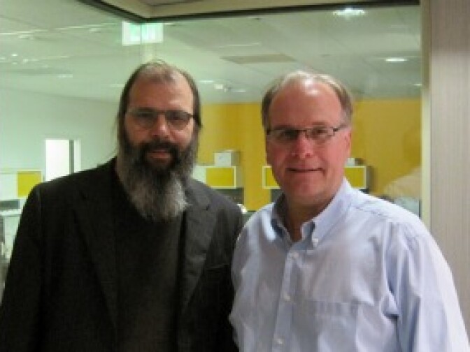 Musician and author Steve Earle with AirTalk host Larry Mantle.