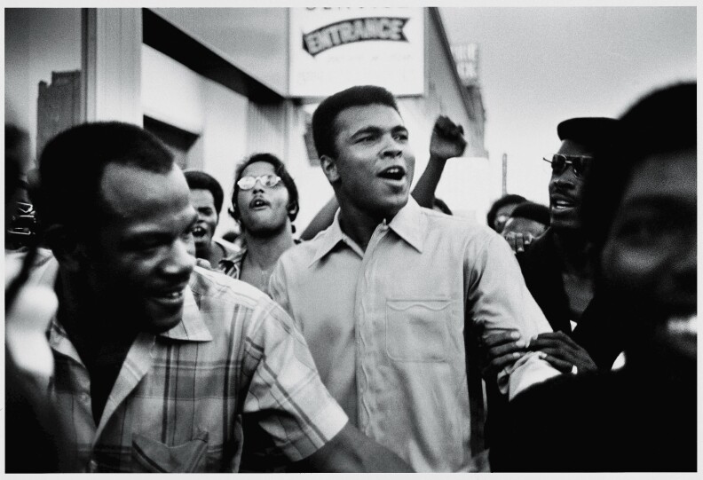 Muhammad Ali walks through the streets of NYC with members of the Black Panther Party, Sept 1970