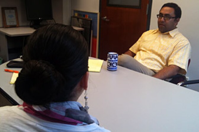 UCLA undocumented student "Sylvia" meets with academic advisor Ernesto Guerrero. Both watched closely this week's Capitol Hill debate of the DREAM Act.